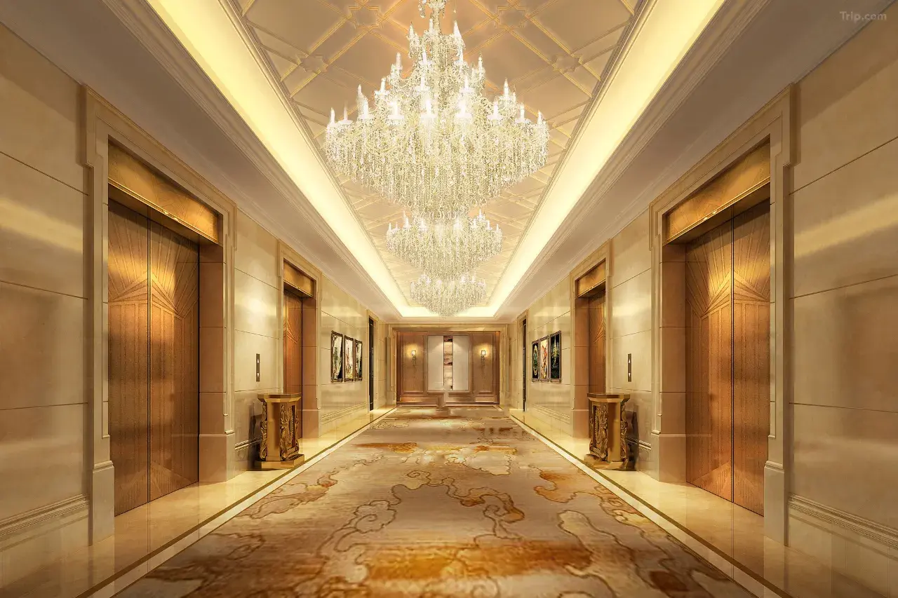 Corridor and guestroom lighting at Sheraton Shaoxing Yukun showing consistent finish across volume production